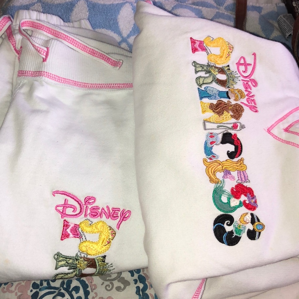Pair of Disney princess sweatpants and hoodie